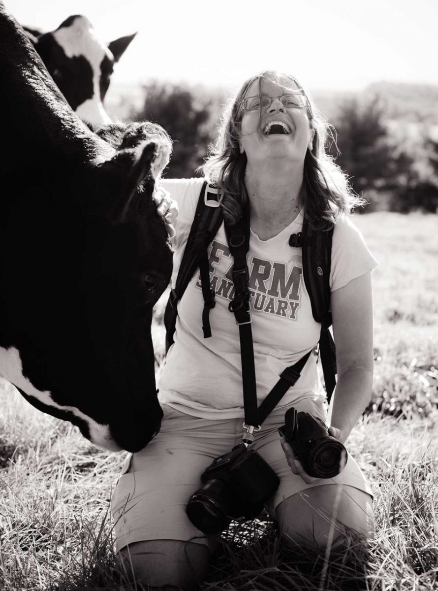 Anita Krajnc, co-founder of The Save Movement, with a bovine friend at Farm Sanctuary. USA, 2014