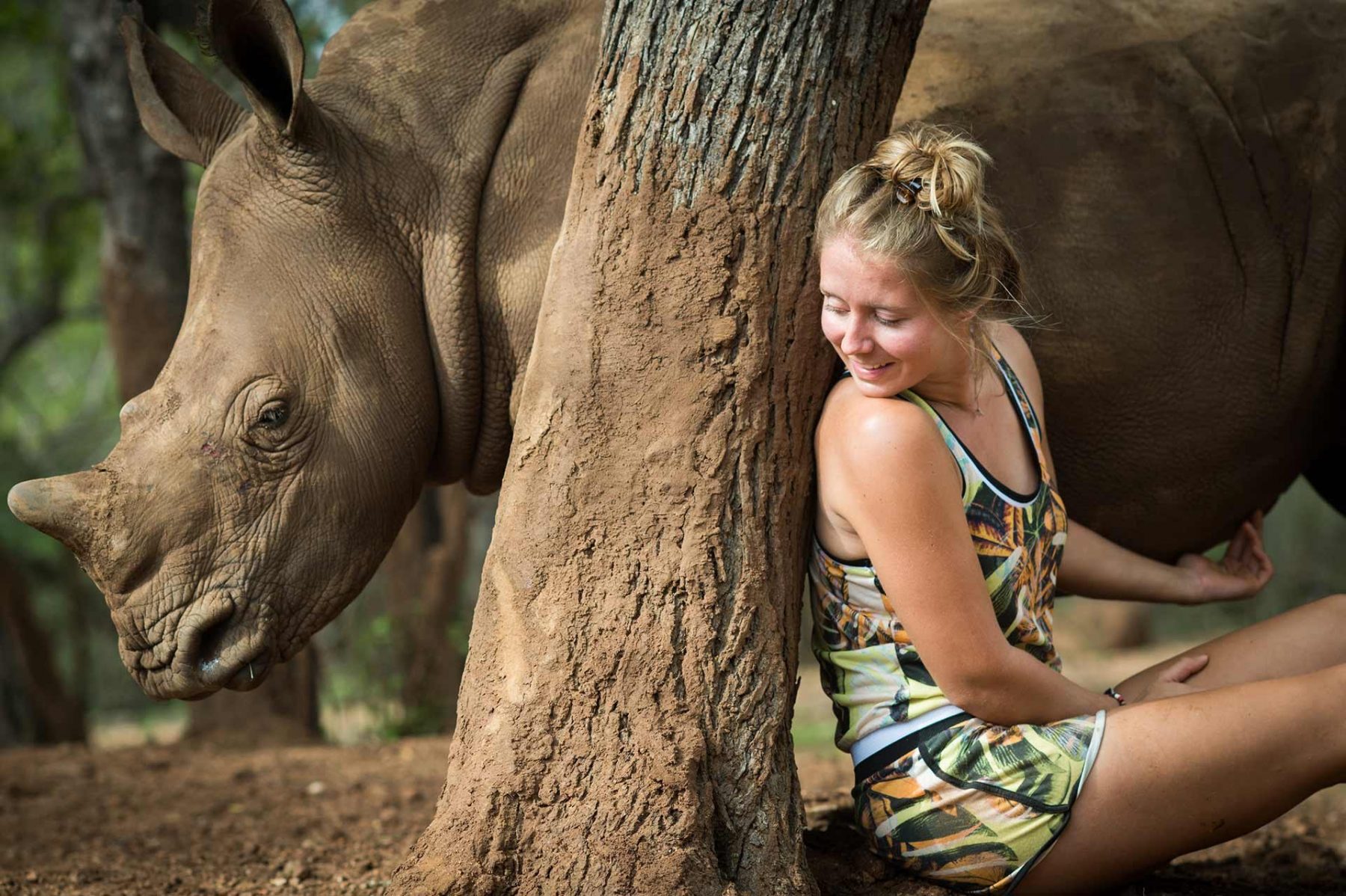 Jade Aldridge at Rhino Revolution with a young rescued rhinoceros, whose mother was killed by poachers. South Africa, 2016